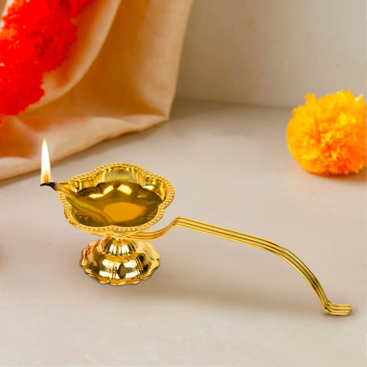 Brass Decorative Pooja Aarti Diya with Handle (L x B x H – 20 x 7 x 5.5 cm ; Weight – 140 gm)