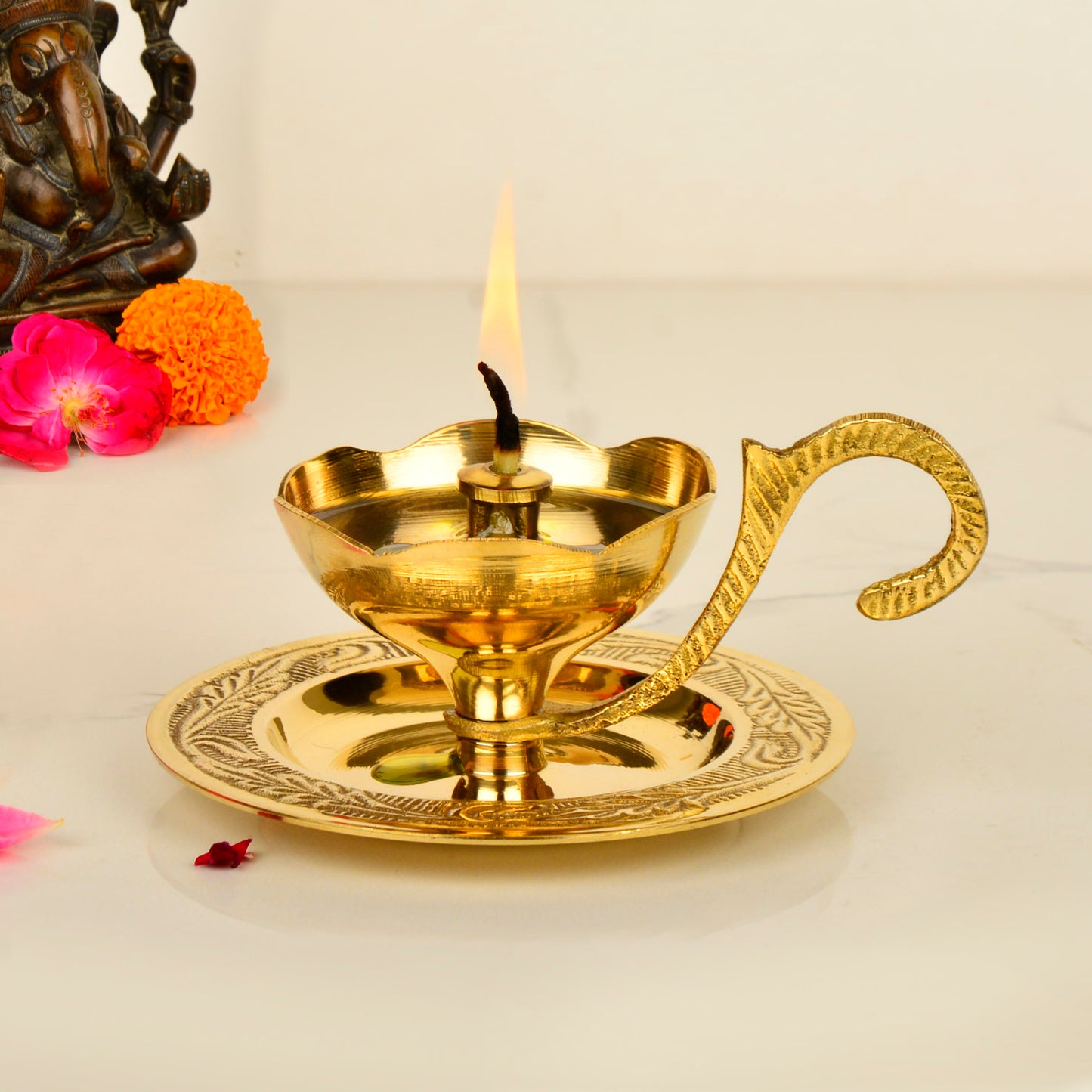 Brass Decorative Pooja Diya with Handle and Plate (L x B x H – 10 x 9 x 5 cm ; Weight – 120 gm) - View 3