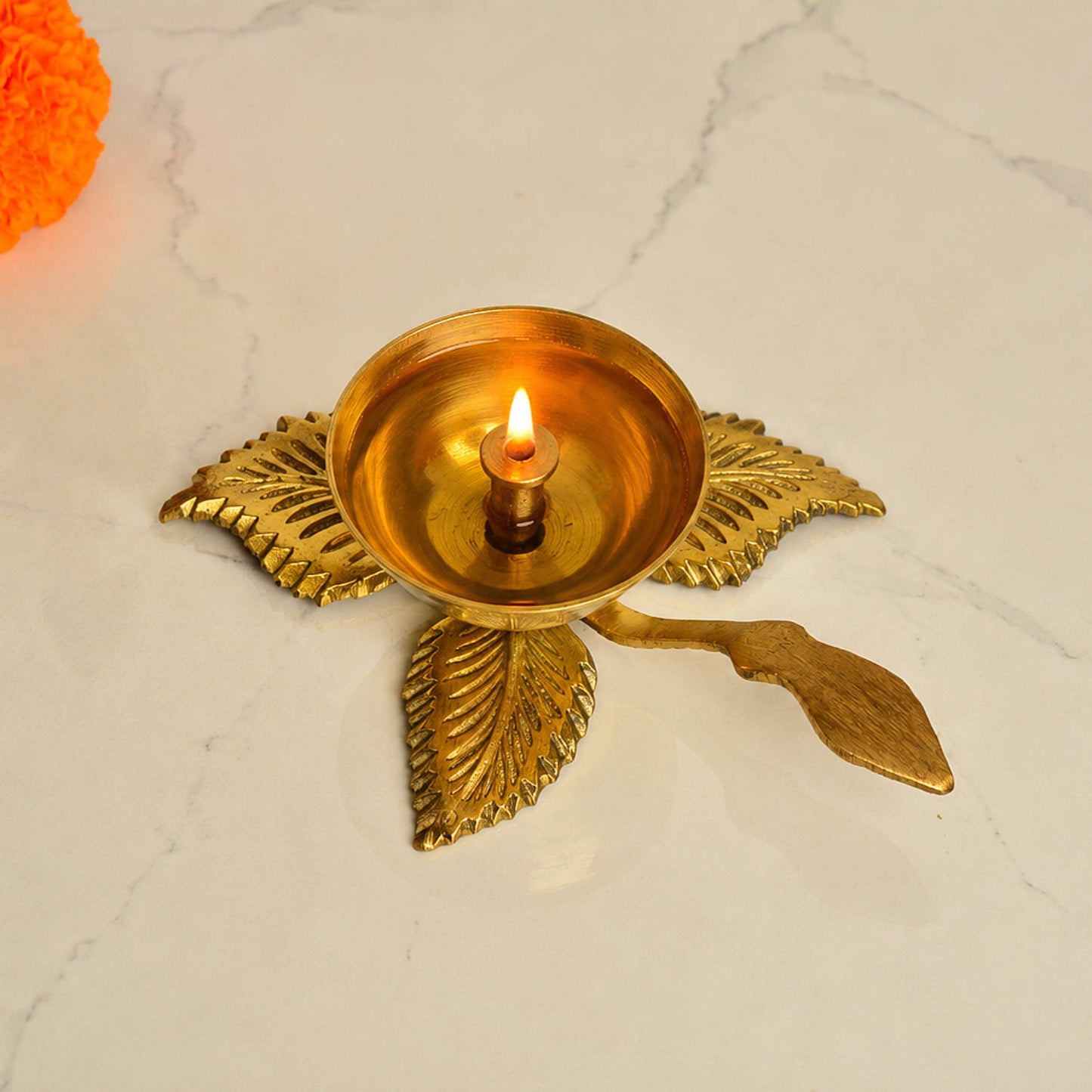 Brass Leaf Design Pooja Aarti Diya with Handle (14 x 10 x 4.5 cm, 110 gm)